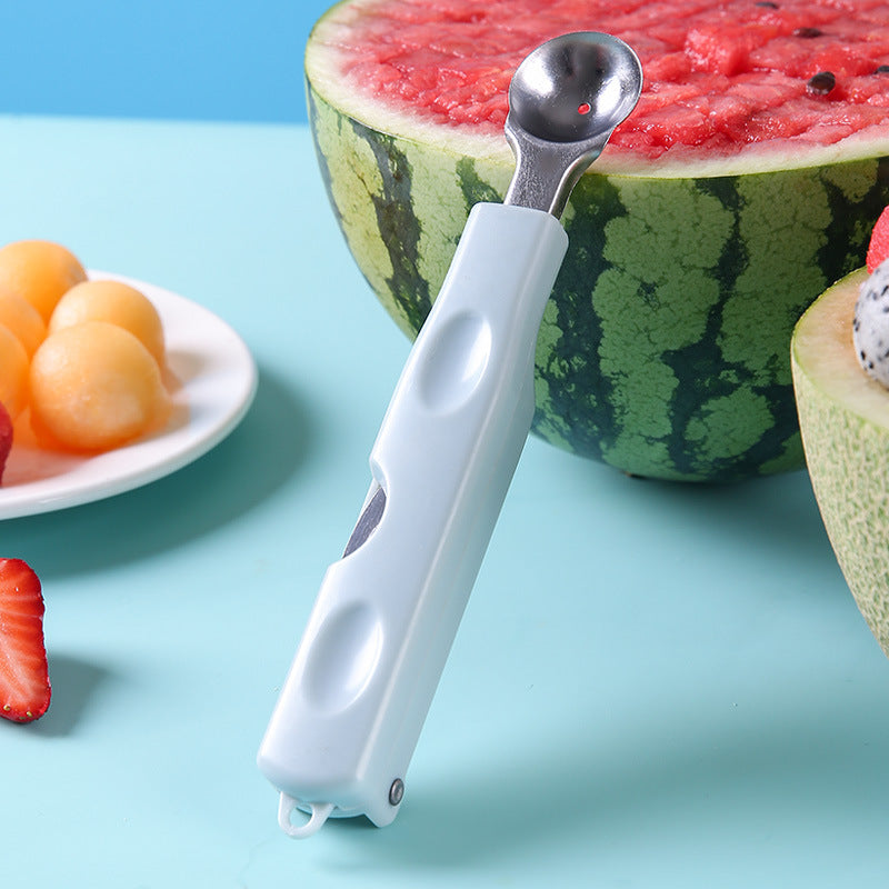 Cortador de frutas multifuncional de acero inoxidable.